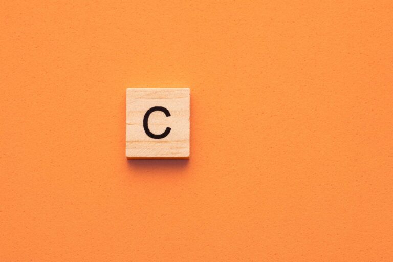 =mc consulting | Use the “C” word more in your in fundraising - a Scrabble C letter block on an orange background
